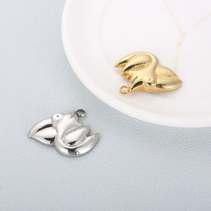 Polished stainless steel pelican bird pendants in gold and silver for jewelry making