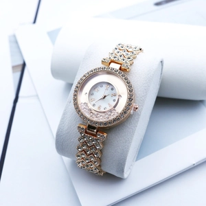 Luxury gold quartz watch for women with sparkling rhinestones and floating crystal dial