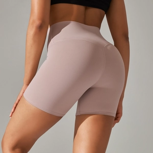 Detail view of high waist yoga shorts with V-shaped back seam for butt lifting effect
