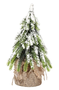 Mini flocked Christmas tree with realistic snow detail and rustic burlap base for tabletop