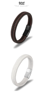 Detail of braided leather bracelets with matte black and brushed silver metal clasps