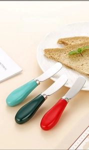 Set di tre coltelli per burro in acciaio inossidabile con manici ergonomici in ceramica