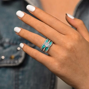 Maillard style silver ring with teal enamel and brilliant round zircon center stone
