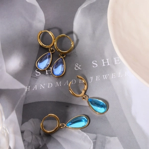 Vintage gold-plated stainless steel hoop earrings with sky blue teardrop gemstones