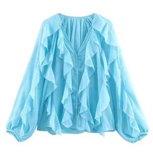 Women's light blue long sleeve chiffon blouse with tiered ruffles and V-neckline