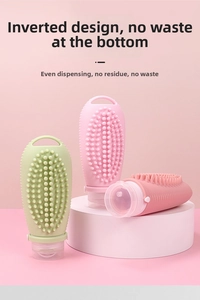 Detail of silicone travel bottles with massage brush and inverted leak-proof design