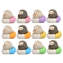 Detailed grid view of twelve resin hedgehog figurines in colorful swim rings