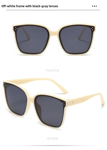 Detail view of cream oversized sunglasses with grey lenses and silver rivets from two angles