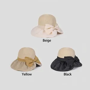 Elegante cappello da sole da donna a tesa larga con fiocco in beige, giallo e nero