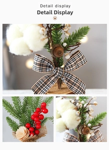 Detail of 25cm Christmas pine tree with red berries, acorns, and cotton on wooden base