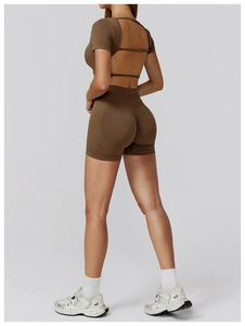 Detail of brown seamless yoga set featuring hollow out back and high waist lifting shorts