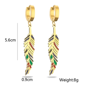 Detailed view of bohemian gold feather earrings with colorful enamel and 5.6cm length