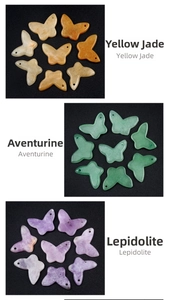 Detail of natural stone butterfly pendants in yellow jade, aventurine and lepidolite