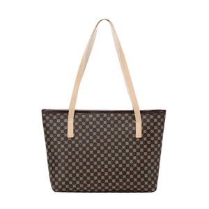 Detail view of the retro geometric pattern on this large brown tote handbag