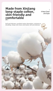 Close-up of soft Xinjiang long-staple cotton fibers showing breathable natural texture
