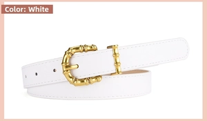 Detail of white thin PU leather belt featuring a golden bamboo-shaped pin buckle