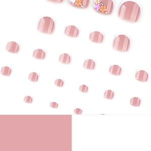 French press-on toenails with white tips and 3D floral accents with small rhinestones