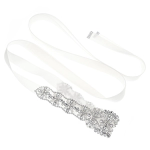 Detail of bridal belt with white satin ribbon and sparkling crystal rhinestone vine pattern