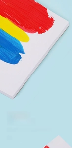 Thick acrylic paper texture showing vivid red, yellow and blue ink smudge resistance