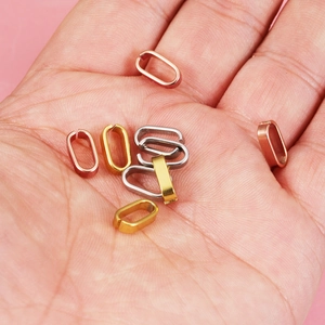 Set of oval stainless steel jewelry clasps in gold silver and rose gold finishes