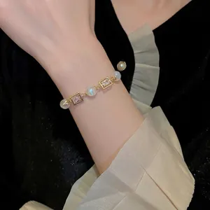 Adjustable mermaid pearl and zircon square charm bracelet for women on wrist