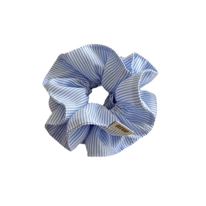 Blue and white striped scrunchie with logo label for elegant hair styling
