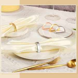 Modern D-shaped metal napkin rings in gold, silver, and rose gold for elegant table settings