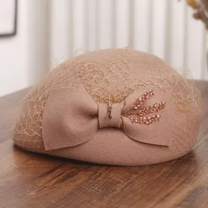 French style camel wool beret with mesh veil and embroidered bow decoration
