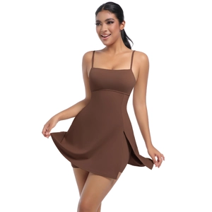 Detail of the side slit and high-stretch fabric on a brown athletic tennis dress