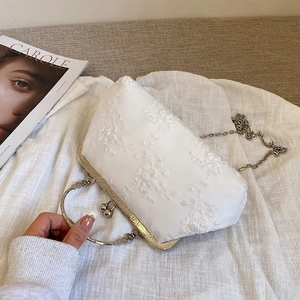 Elegant white lace embroidery chain crossbody bag with vintage metal clasp and handle