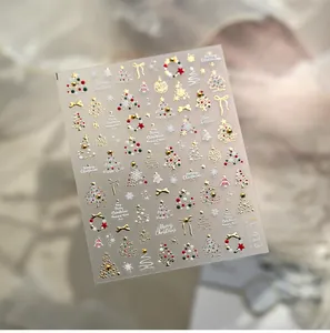 Detail of Christmas nail decals with 3D gold embossed trees and snowflakes TL-413