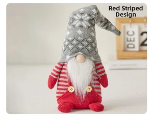 Detailed view of handmade Christmas gnome doll with gray knitted hat and red striped outfit