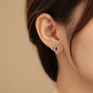 Vintage silver stud earrings with red oval zircon and micro-pave crystal flower petals