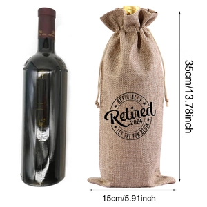 Detail view of linen wine gift bag featuring 'OFFICIALLY Retired 2024' print with dimensions