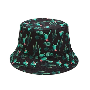Reversible bucket hat with green cactus and pink flower pattern on black canvas background