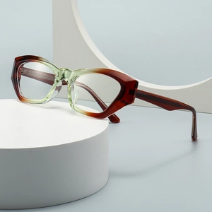 Occhiali da sole geometrici cat-eye retrò con montatura sfumata marrone e verde su base