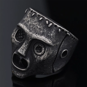 Gothic punk skull mask ring in vintage stainless steel with weathered industrial finish