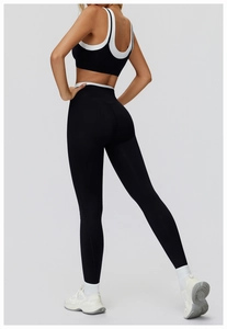 Detailed back view of high-waisted ribbed yoga leggings and contrast sports bra set