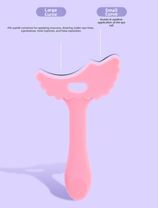 Silicone eyeliner aid tool for flawless eye makeup, portable wing shaped mascara shield.