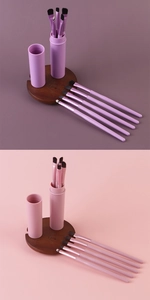 Detail view of 5-piece makeup brush set with matching portable storage bucket in pink and purple