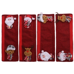 Detailed view of 4 Christmas fridge handle covers with plush Santa and snowman designs