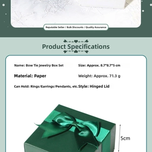 Detail view of dark green bow jewelry gift box with dimensions and paper texture specifications