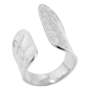 Detail showing the hammered texture on a polished silver open ring with irregular edges