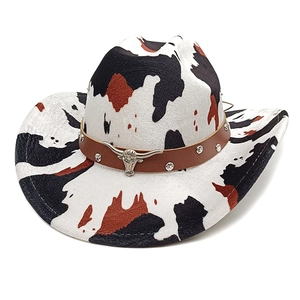 Western cowboy hat with cow print pattern and studded leather band featuring bull head