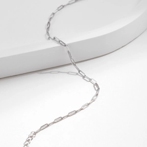 Minimalist 925 sterling silver chain bracelet with rectangular links on white display