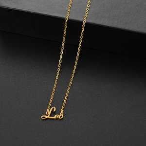 Minimalist gold Leo constellation letter pendant necklace with a fine stainless steel chain