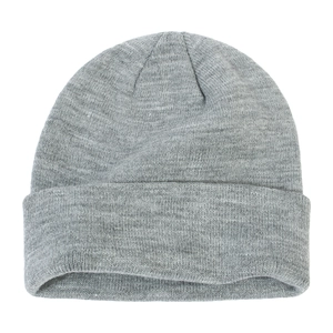 Detailed macro view of a grey knitted beanie hat with a folded cuff for winter warmth