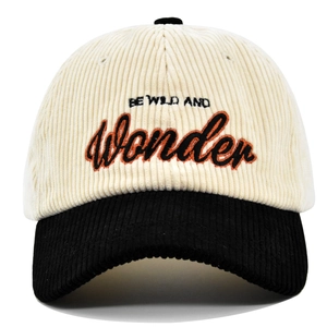 Corduroy baseball cap with Be Wild and Wonder embroidery in beige and black colors