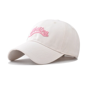 Close-up of pink 3D embroidery showing nothing text on beige cotton baseball cap