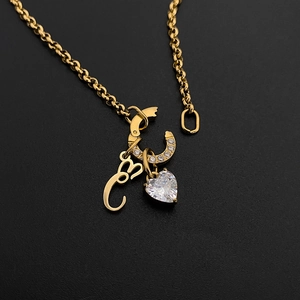 Gold titanium steel necklace with artistic letter C and heart crystal charms